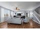 Spacious living room featuring hardwood floors and a ceiling fan at 4067 S Odessa St, Aurora, CO 80013