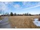 Open green space with a paved pathway and neighborhood views at 4067 S Odessa St, Aurora, CO 80013