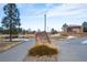 Park entrance sign and pathway with playground in background at 4067 S Odessa St, Aurora, CO 80013