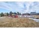 Community playground with play structures and pavilion at 4067 S Odessa St, Aurora, CO 80013