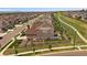 Aerial view of a brown home, showcasing its well-manicured yard and neighborhood at 848 Sandstone Cir, Erie, CO 80516