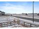 Peaceful street view with scenic views of a wide open field at 848 Sandstone Cir, Erie, CO 80516