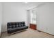 Well-lit bedroom with a futon and a window seat at 11337 E 1St Ave, Aurora, CO 80010