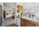 Bright, open kitchen features ample counter space, modern appliances, and a connected living space at 11337 E 1St Ave, Aurora, CO 80010