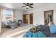 Spacious bedroom features a tray of wine and a balcony with lots of natural light at 4525 King St, Denver, CO 80211