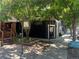 Charming storefront of Small Batch with outdoor space and greenery at 4525 King St, Denver, CO 80211
