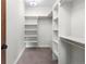 Large walk-in closet offering abundant hanging and shelving space at 4525 King St, Denver, CO 80211