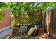 Serene backyard featuring cushioned seating, a privacy screen, and a gravel ground cover at 1243 N Lafayette St, Denver, CO 80218