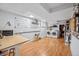 Spacious basement with laundry, open shelving, workspace and great lighting at 1243 N Lafayette St, Denver, CO 80218
