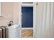 Bathroom view with a modern sink, tile flooring, and view into another bathroom at 1243 N Lafayette St, Denver, CO 80218