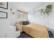 Charming bedroom with a comfortable sofa bed, light, and cozy decor at 1243 N Lafayette St, Denver, CO 80218