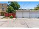 Row of garages in a well-maintained alleyway, with easy access for parking and storage at 1243 N Lafayette St, Denver, CO 80218