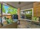 Inviting covered patio with comfortable seating, grill, and convenient access to indoor space at 11209 Quivas Loop, Denver, CO 80234