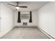 Bedroom with neutral carpeting, a ceiling fan and an exterior window at 3450 S Poplar St # 109, Denver, CO 80224