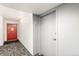 Hallway with unit doors and modern lighting at 3450 S Poplar St # 109, Denver, CO 80224