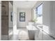 Spa-like bathroom with walk-in shower and bathtub at 62 N Jasmine St, Denver, CO 80220