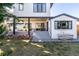 Modern home exterior with large windows and backyard deck at 62 N Jasmine St, Denver, CO 80220