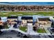 Aerial view of a two-story house and neighborhood at 1867 Homestead Dr, Fort Lupton, CO 80621