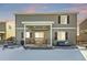 Covered patio with string lights, grill, and seating area at 1867 Homestead Dr, Fort Lupton, CO 80621