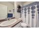 Small bathroom with shower/tub combo and updated vanity at 1867 Homestead Dr, Fort Lupton, CO 80621