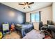 bedroom with a bed, desk, and toys at 1867 Homestead Dr, Fort Lupton, CO 80621