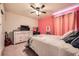 Bedroom with full-size bed and plenty of storage at 1867 Homestead Dr, Fort Lupton, CO 80621