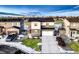 Stylish two-story home boasting neat landscaping, a two-car garage, and a welcoming front entrance, set in a residential area at 1867 Homestead Dr, Fort Lupton, CO 80621