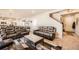 Inviting living room featuring plush leather seating and an attractive rug at 1867 Homestead Dr, Fort Lupton, CO 80621