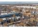 Panoramic aerial view showcases the neighborhood, pond, and distant mountains at 4571 Stuart St, Denver, CO 80212