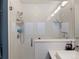 Walk-in shower with white subway tile and glass surround at 4571 Stuart St, Denver, CO 80212
