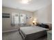 Bedroom with neutral walls and two large windows at 4571 Stuart St, Denver, CO 80212