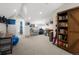Versatile bonus room space, with work area and a bathroom to the rear at 4571 Stuart St, Denver, CO 80212