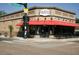 Exterior view of building with red awning and street corner location at 4571 Stuart St, Denver, CO 80212