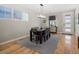 Bright dining room featuring hardwood floors and a stylish chandelier at 4571 Stuart St, Denver, CO 80212