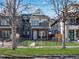 Charming two-story home with a well-manicured front yard and a classic craftsman style at 4571 Stuart St, Denver, CO 80212