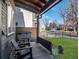 Relaxing front porch with comfortable seating and a view of the well-maintained front yard at 4571 Stuart St, Denver, CO 80212