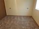 Cozy bedroom with carpet flooring and neutral-colored walls at 8353 Gaylord St, Denver, CO 80229