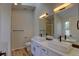 Bright bathroom featuring double sinks and modern fixtures at 1767 High Plains Ct, Superior, CO 80027