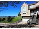 Inviting townhouse with mountain views, private entrance, and an attached garage on a sunny day at 1767 High Plains Ct, Superior, CO 80027