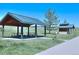 Open park area featuring a covered picnic shelter with tables, and a restroom at 1767 High Plains Ct, Superior, CO 80027