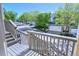 Neighborhood view from the stairs, showcasing a row of townhouses along a tree-lined street at 1767 High Plains Ct, Superior, CO 80027