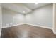 Finished basement with hard floors offering flexible space for recreation or storage at 15628 W Baker Ave, Lakewood, CO 80228