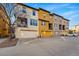 Charming townhomes feature attached garages and private balcony space at 15628 W Baker Ave, Lakewood, CO 80228