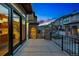 Private patio offers seamless indoor/outdoor living with sliding glass door access at 15628 W Baker Ave, Lakewood, CO 80228