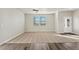 Spacious living room with carpet, lots of natural light, and a ceiling fan at 3003 Pershing St, Strasburg, CO 80136