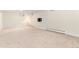 Finished basement offers versatile living space with neutral carpet at 6620 E Virginia Ave, Denver, CO 80224