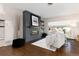 Living room with modern fireplace, hardwood floors, and large windows at 6620 E Virginia Ave, Denver, CO 80224