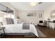 Spacious main bedroom with hardwood floors and neutral color palette at 6620 E Virginia Ave, Denver, CO 80224