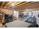 Partially finished basement provides ample space for storage and recreational equipment at 21063 E Greenwood Pl, Aurora, CO 80013