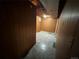 The unfinished basement features paneled walls, a window and tile flooring at 1836 E Mineral Ave, Centennial, CO 80122